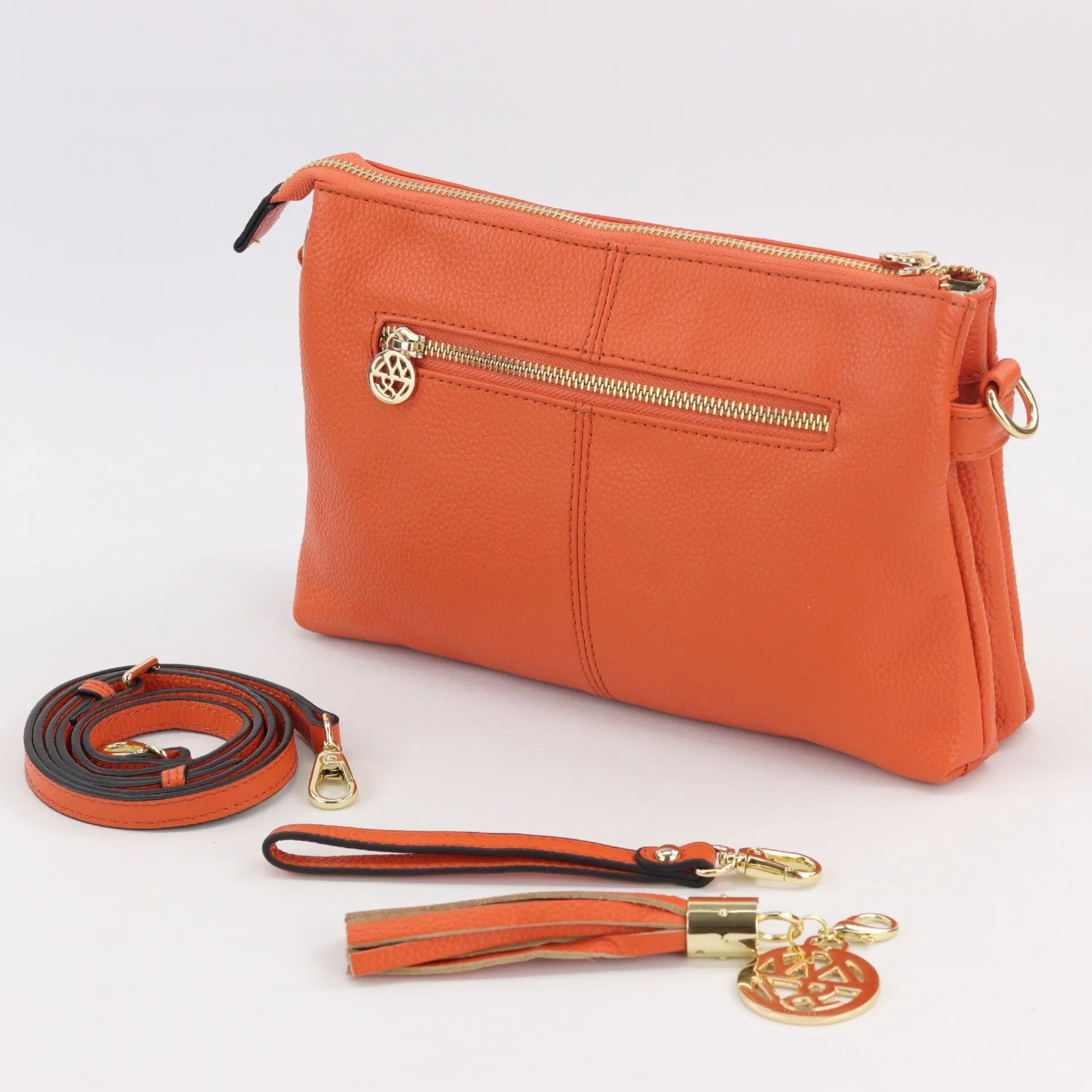 Ruby leather or suede clutch crossbody bag