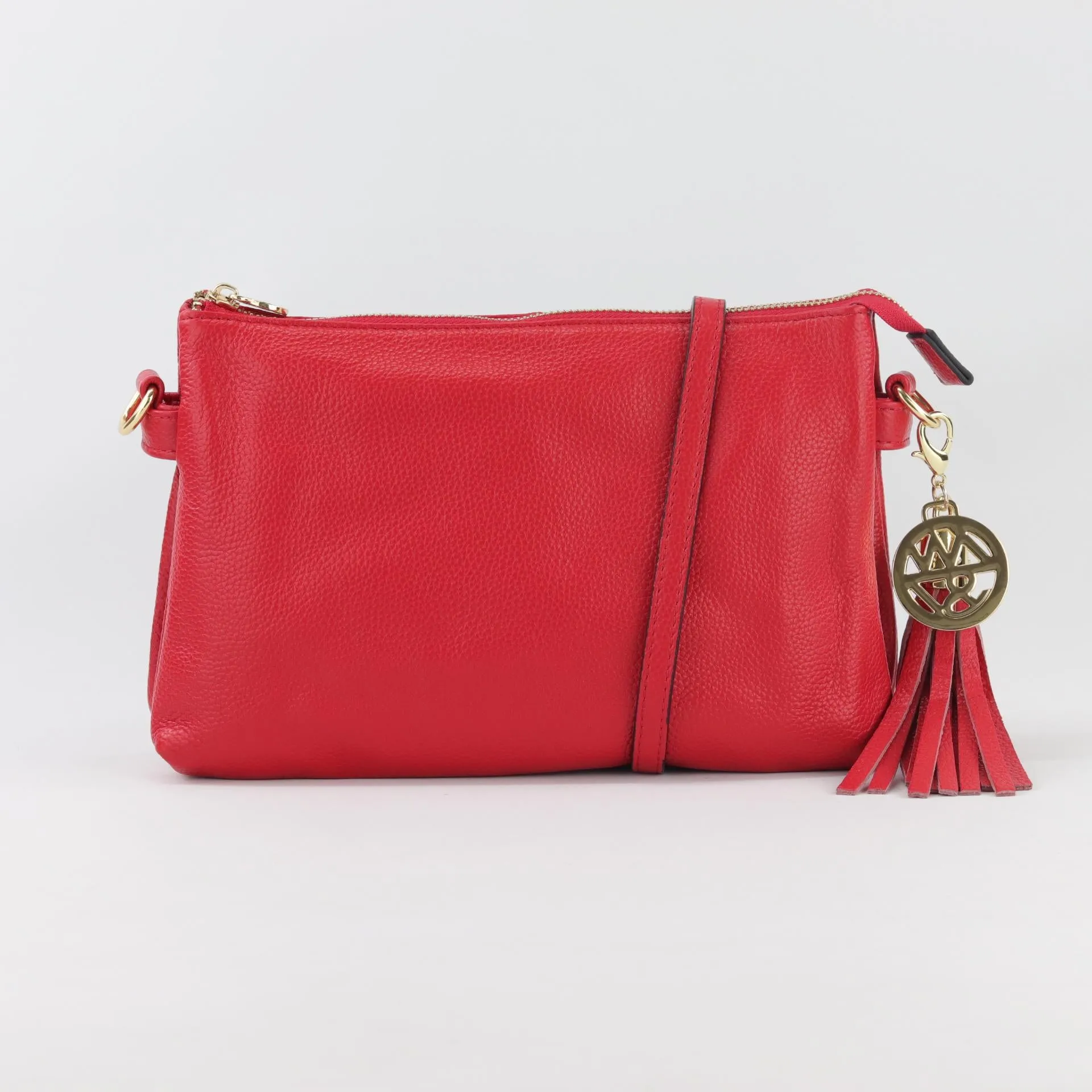 Ruby leather or suede clutch crossbody bag