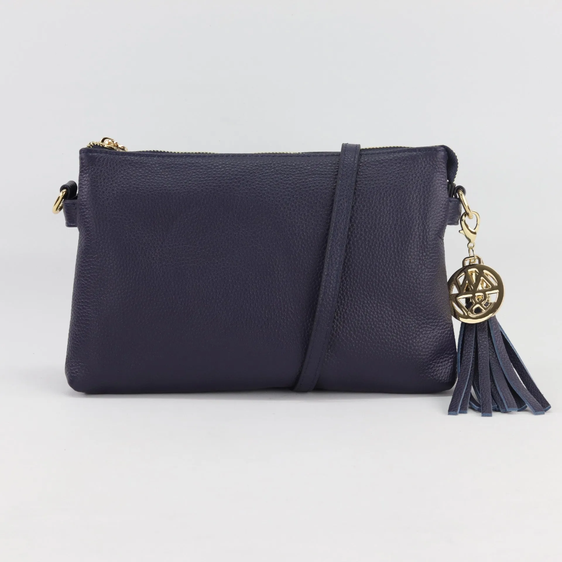 Ruby leather or suede clutch crossbody bag