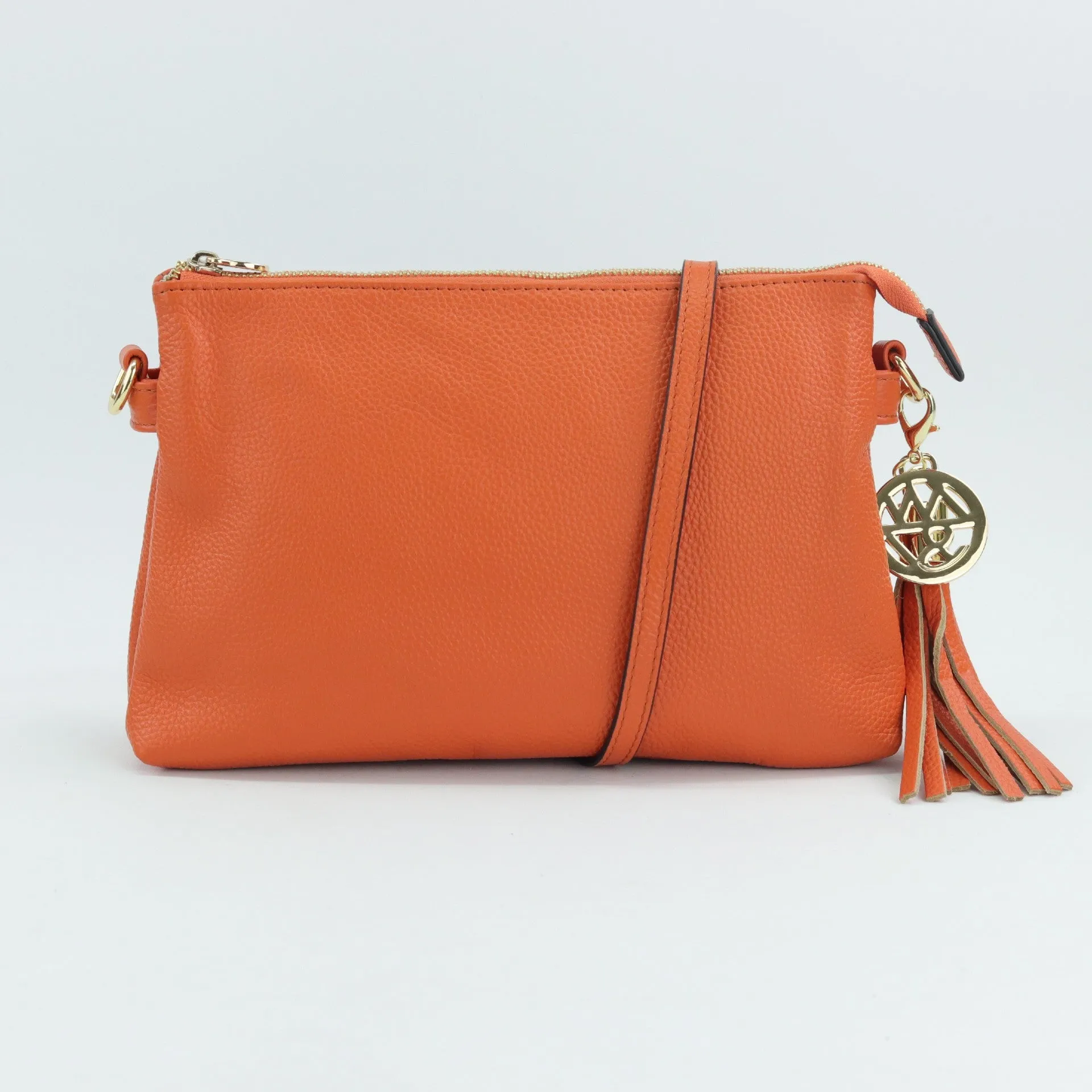 Ruby leather or suede clutch crossbody bag